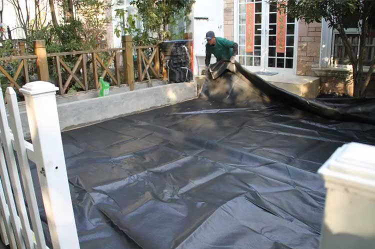 artificial-grass-installation-add-weed-barrier